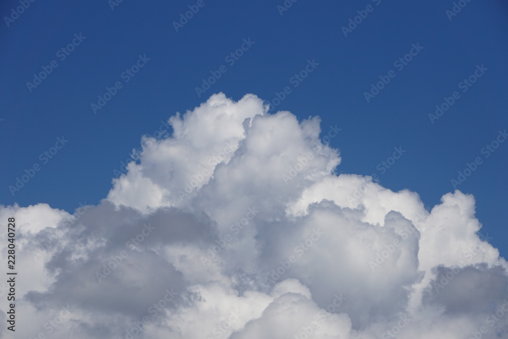 Amazing cumulus clouds and sunlight on the background of clear blue sky, Summer in GA USA. Amazing cumulus clouds and sunlight on the background of clear blue sky, Summer in GA USA.