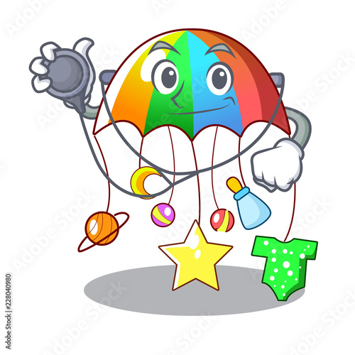 Doctor character hanging toy attached to cot