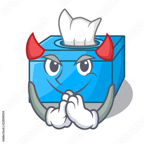 Devil cartoon tissue box on a sideboard