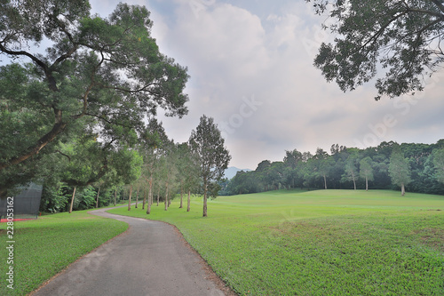 walk way and green field at golf club