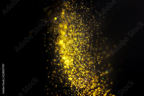 Abstract background with defocused particles