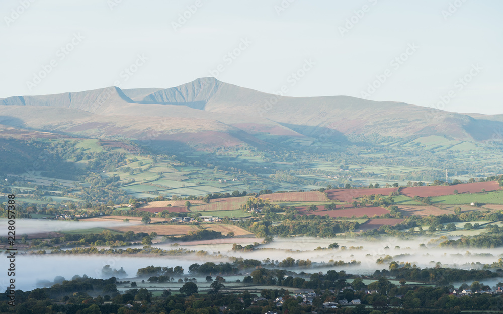 Morning mist in the valley below Pen y Fan, Brecon Beacons, Wales.