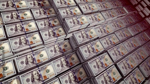 Bundles of 100 dollar bills in a stongbox