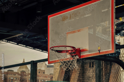 Old basketball net urban style, under a bridge in NY