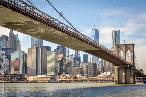 Brooklyn bridge from below with Manhattan in Background