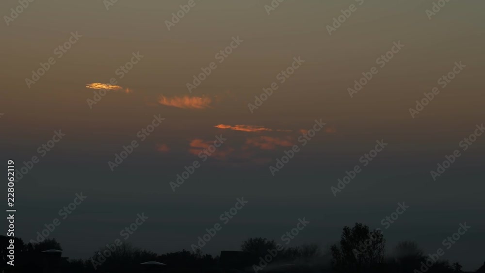 Early morning, sunrise in thick fog, residential area of the city, outskirts of the city, timelapse, morning dawn, morning, close-up Early morning, sunrise in thick fog, residential area of the city, outskirts of the city, timelapse, morning dawn, morning, close-up