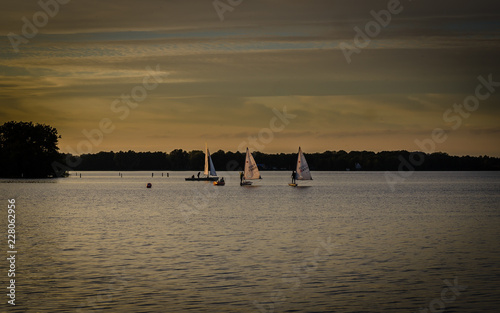 Groningen, Holland. Octorber, 08, 2018: Late evening sailing at the paterswoldse meer before sunset photo