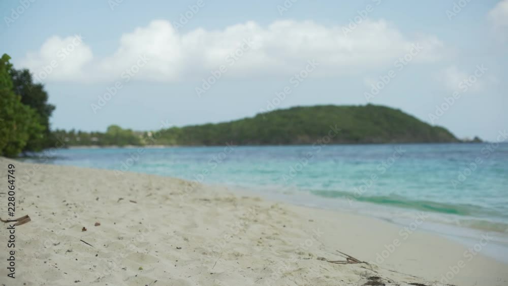 Background Plate of Sand-level shot of the Caribbean shoreline for green screen Background Plate of Sand-level shot of the Caribbean shoreline for green screen