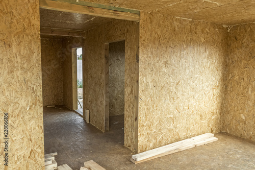 Construction of a wooden house of SIP panels. photo