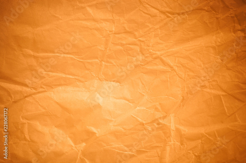 Brown crumpled paper background.