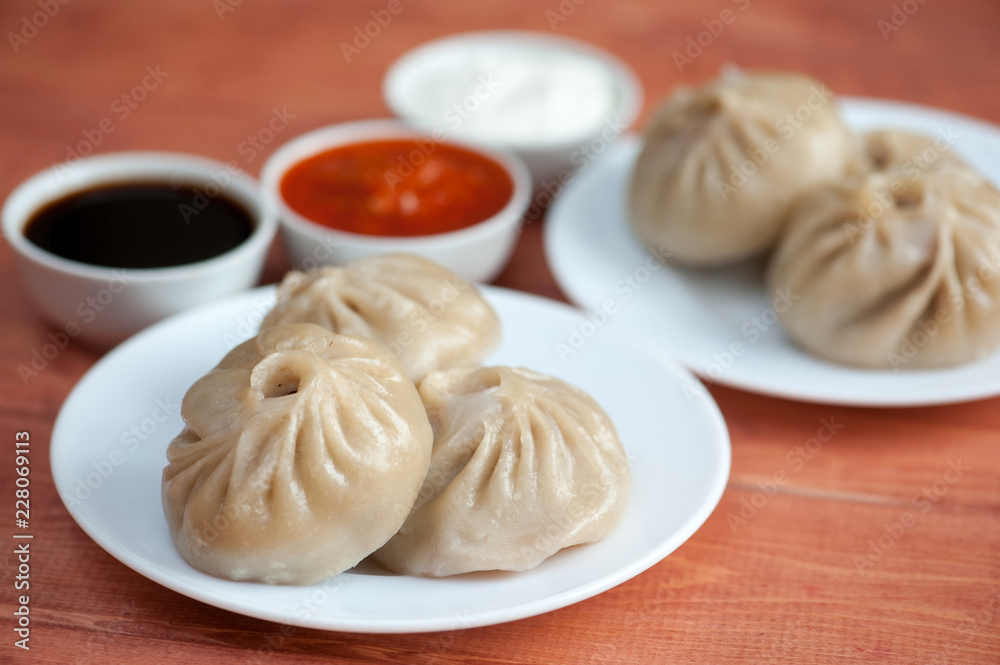 Buuza poza is a Buryat national dish, paste packet. Buuza poza is a Buryat national dish, paste packet.