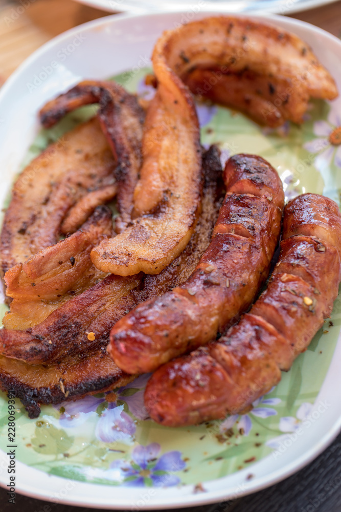 Unhealthy but tasty grilled sausages and meat
