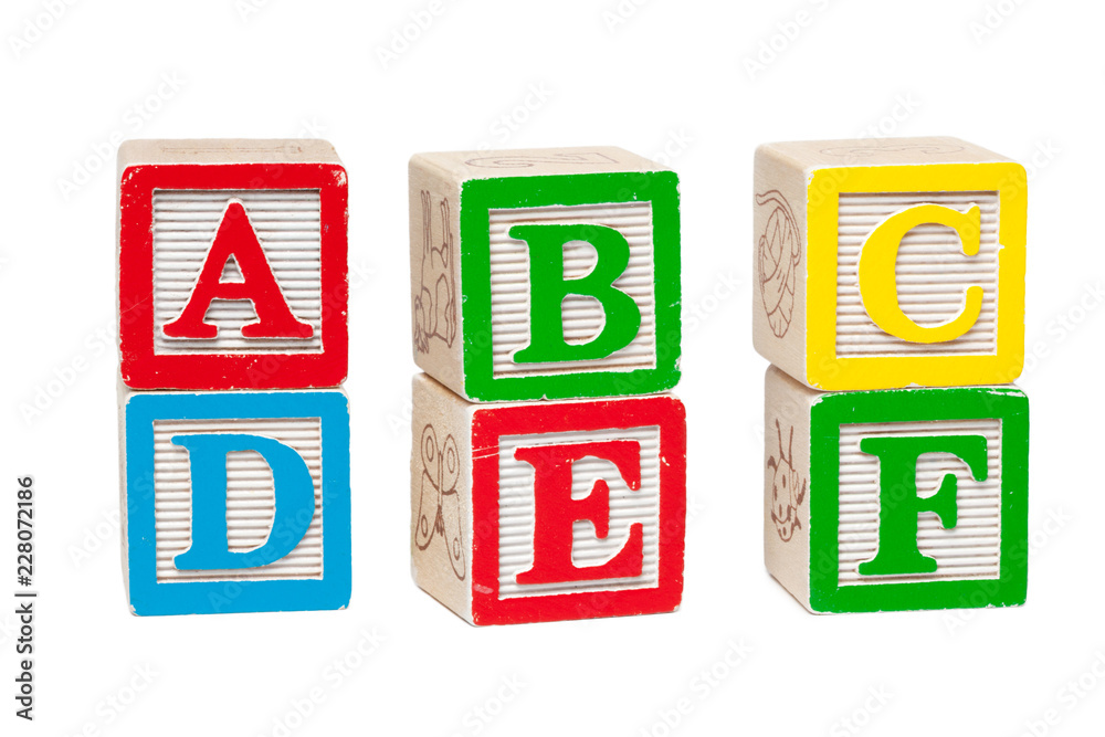 Wooden alphabet blocks isolated on white background Wooden alphabet blocks isolated on white background