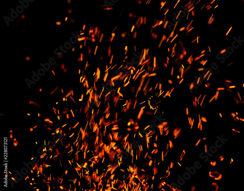 flame of fire with sparks on a black background