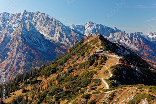 Sunny, autumnal views of Jenner cable car station from ridge of Hohes Brett in Berchtesgaden Alps, Bavaria, Germany