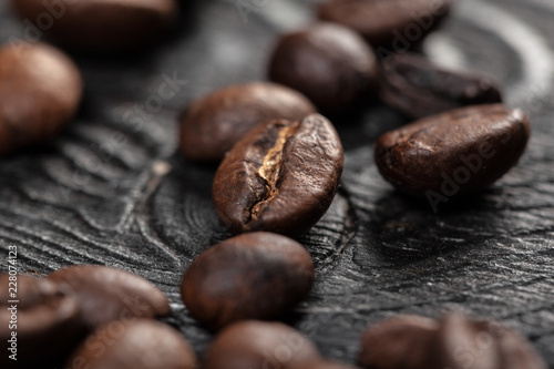 Coffee beans on wood background