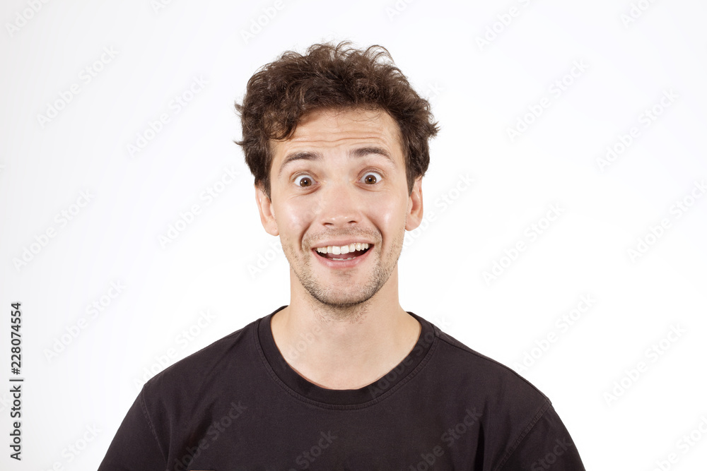 Fototapeta premium Young boy in T-shirt grimacing