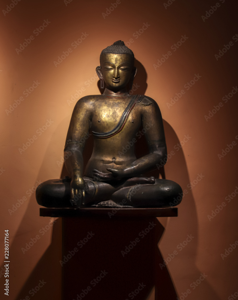 Statue of Gautam Buddha meditating, placed at Patan Museum in Nepal