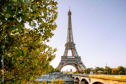 View on the Eiffel tower on Seine river during the sunrise in Paris © rh2010