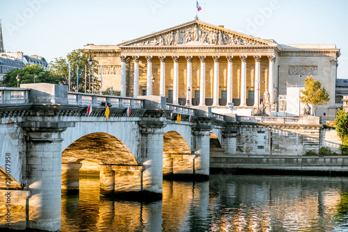 Landscape view of Concordia Bridge with National Assembly of France in Paris photo