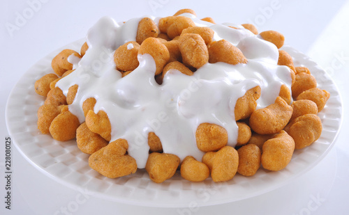 Dahi Bhallay, A yogurt base deleciuos street snack available with plain spicy, mix chat, papri, meethe & chana chaat  photo