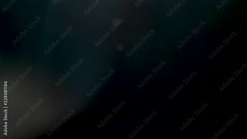 Beautiful abstract dynamic lens flares over a black background Beautiful abstract dynamic lens flares over a black background
