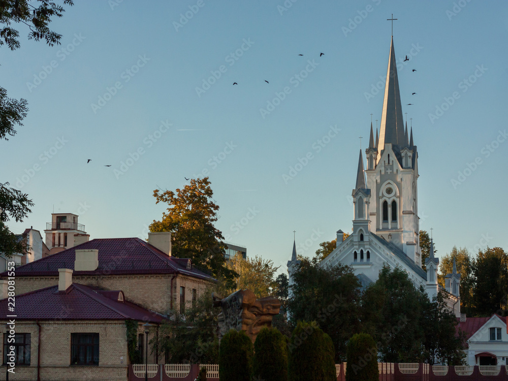 Sights and views of Grodno. Belarus. Lutheran Church in the rays of the setting sun.