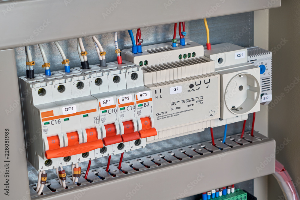 Circuit breakers, controller or control relay, socket, thermostat in electrical Cabinet. The electrical equipment is installed on the circuit Board according to the scheme. Reliable, modern equipment.