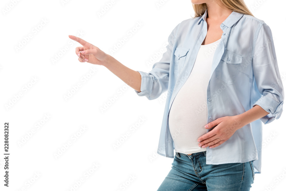 cropped shot of pregnant woman pointing at blank space isolated on white cropped shot of pregnant woman pointing at blank space isolated on white