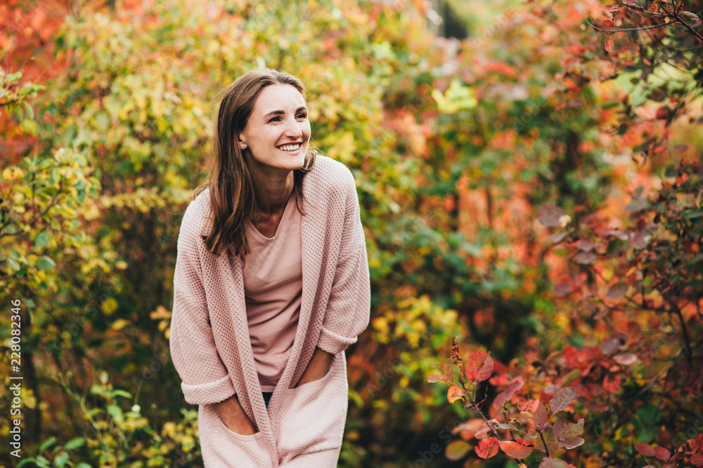 Outdoor atmospheric lifestyle photo of young beautiful lady. Brown hair and eyes. autumn, portrait Outdoor atmospheric lifestyle photo of young beautiful lady. Brown hair and eyes. autumn, portrait
