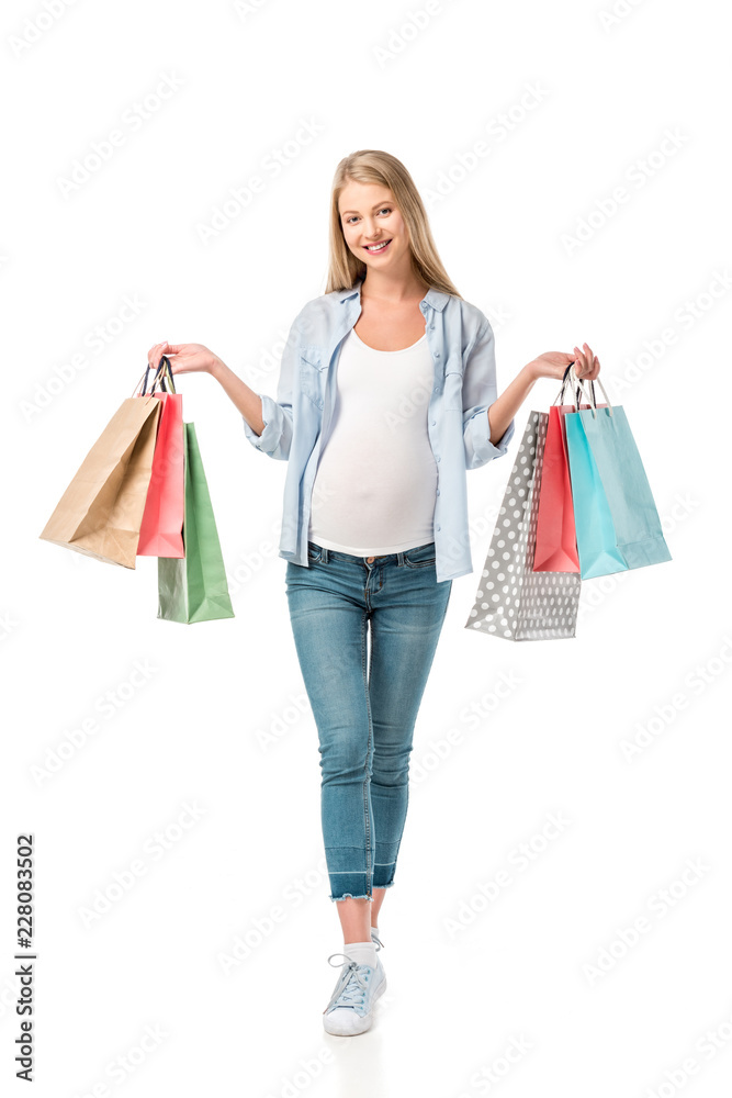 beautiful pregnant girl holding shopping bags isolated on white beautiful pregnant girl holding shopping bags isolated on white