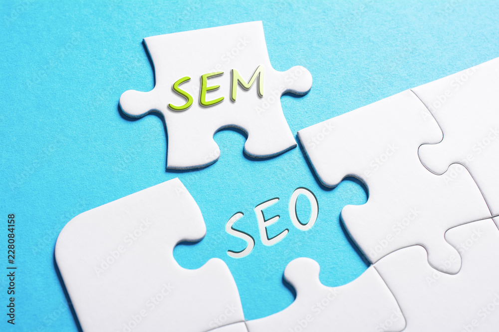 The Words SEO And SEM In Missing Piece Jigsaw Puzzle Stock Photo | Adobe  Stock