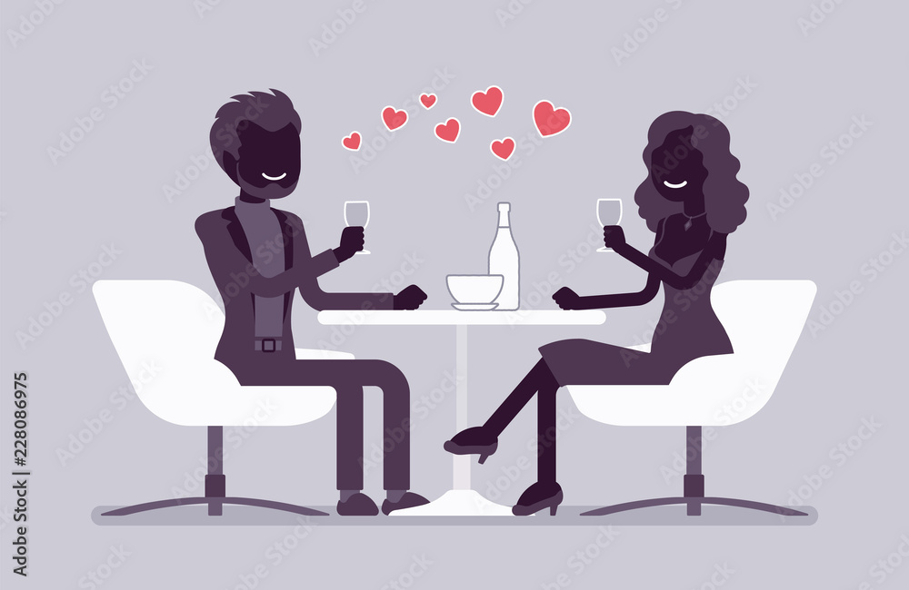 Couple enjoy romantic dinner in restaurant
