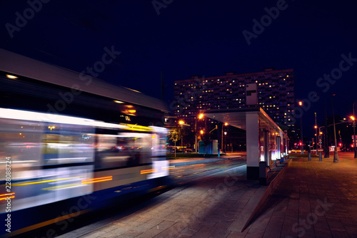 public transport metropolis  traffic and blurry lights train at night.