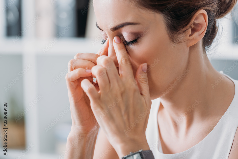 attractive tired businesswoman having headache attractive tired businesswoman having headache