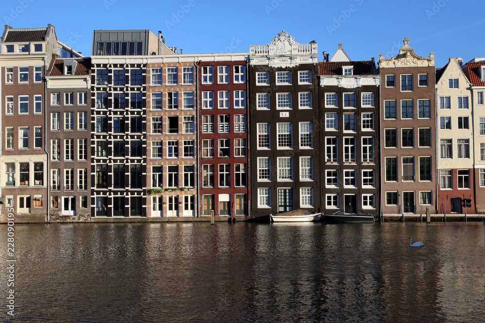 houses at damrak amsterdam
