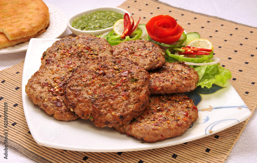 Chapli Kebabs or Chapli Kababs, Famous Food of Peshawar Pakistan Chapli Kebabs or Chapli Kababs, Famous Food of Peshawar Pakistan