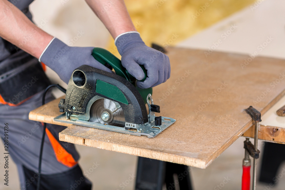 Wood cutting with circular saw Wood cutting with circular saw