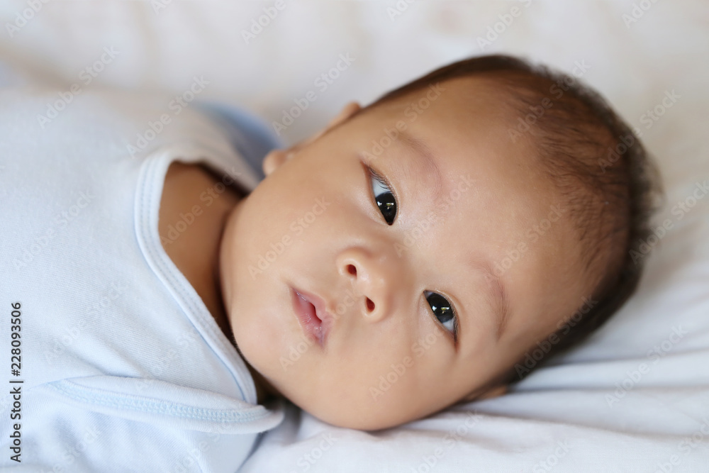 Asian Infant in a surprised on face Feeling. Asian Infant in a surprised on face Feeling.