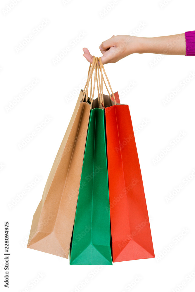 Shopping woman holding bags isolated on white background, consumerism, sale and people concept