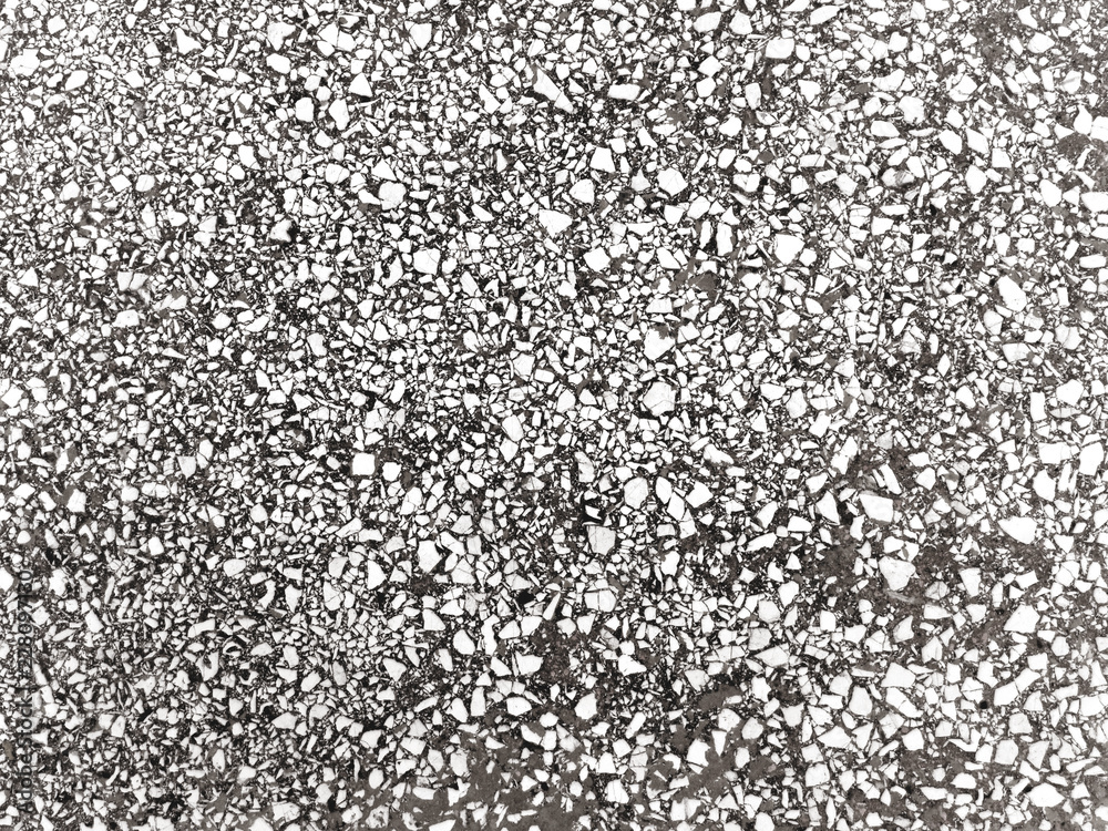 Weathered black and white Italian terrazzo's floor background