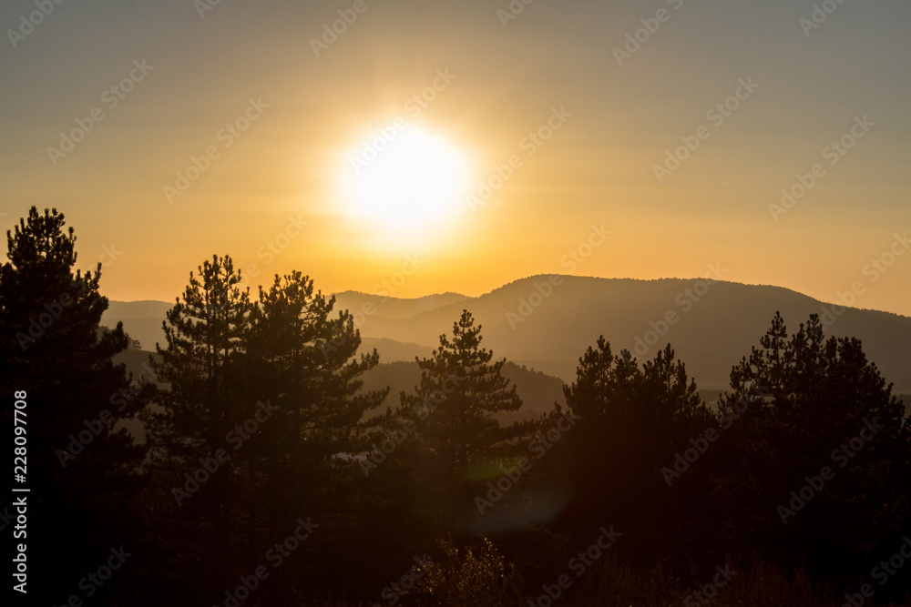 Obraz premium Golden sunset panorama of Zlatibor mountain. Tourist destination in Serbia.