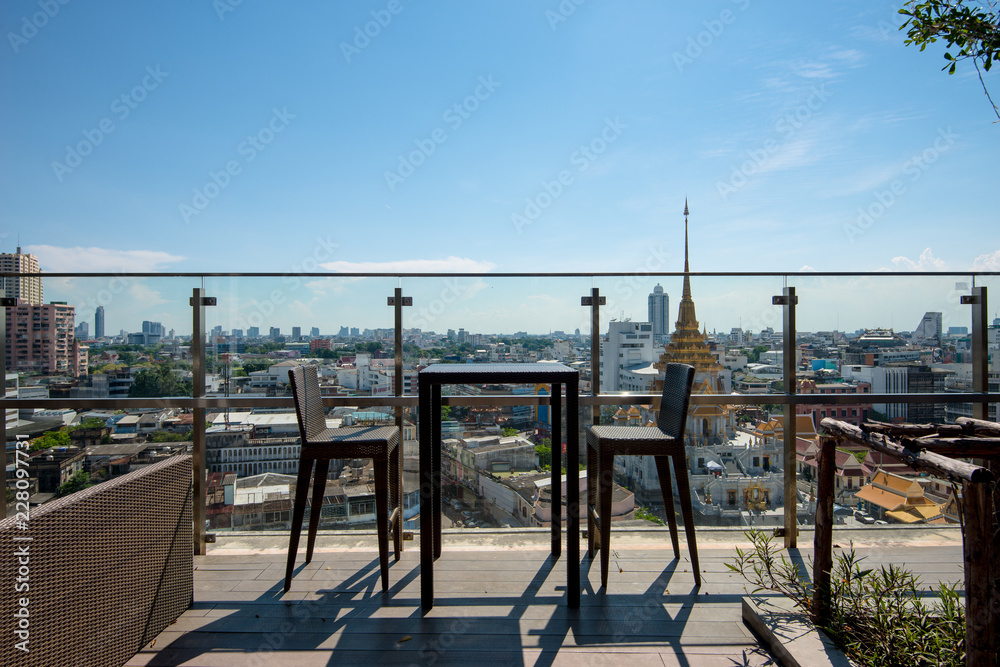 two chair at terrace restaurant with temple in bangkok view background two chair at terrace restaurant with temple in bangkok view background