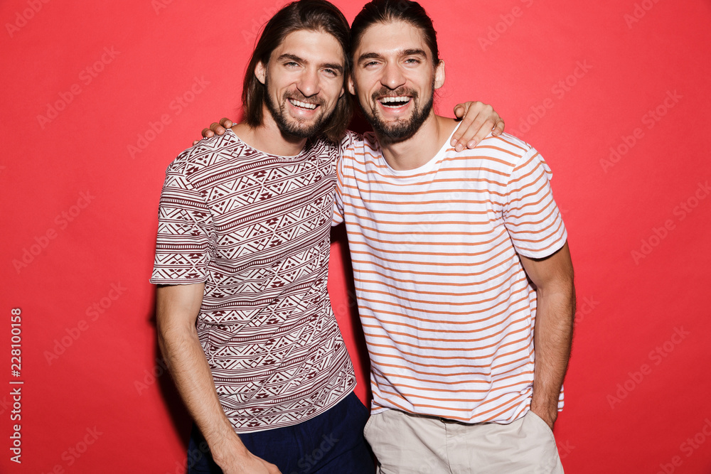 Portrait of two smiling twin brothers Portrait of two smiling twin brothers