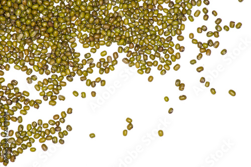 Lot of whole dry green mung beans left upper corner flatlay isolated on white background