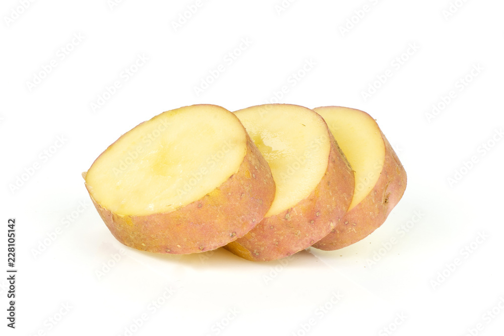 Group of three slices of fresh red potato francelina variety isolated on white background Group of three slices of fresh red potato francelina variety isolated on white background