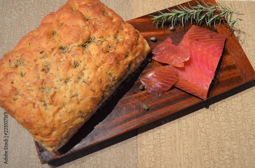 Smoked Salmon and Focaccia on Cutting Board  photo