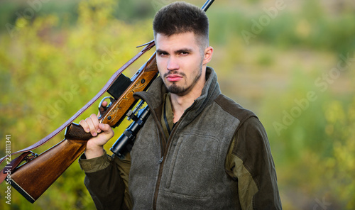 Experience and practice lends success hunting. How turn hunting into hobby. Guy hunting nature environment. Masculine hobby activity. Hunting season. Man bearded hunter with rifle nature background