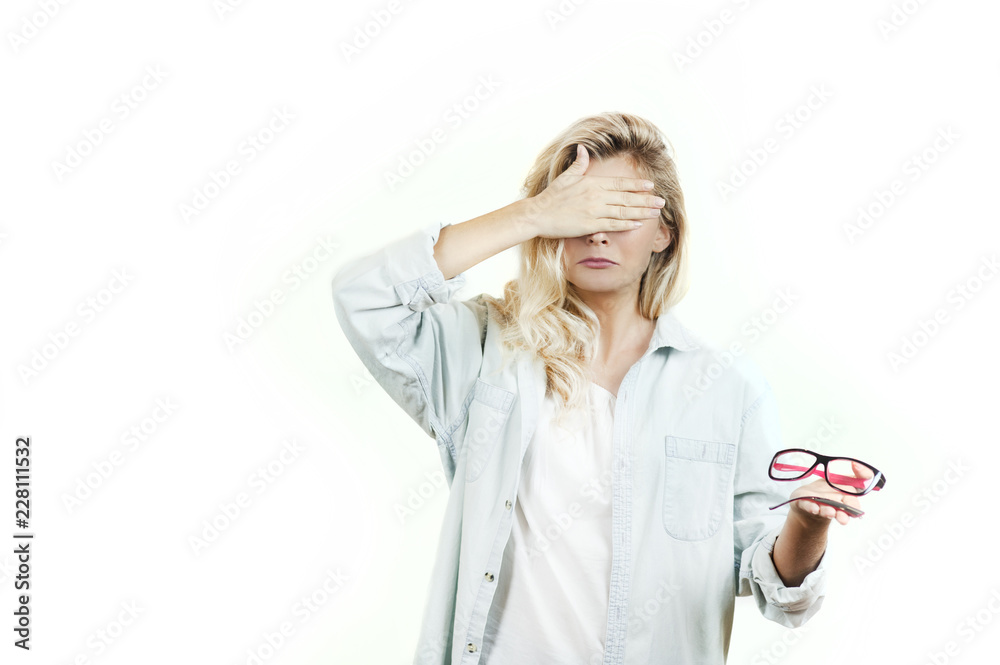 very beautiful young girl broke glasses and holds them in her hands on a white background very beautiful young girl broke glasses and holds them in her hands on a white background