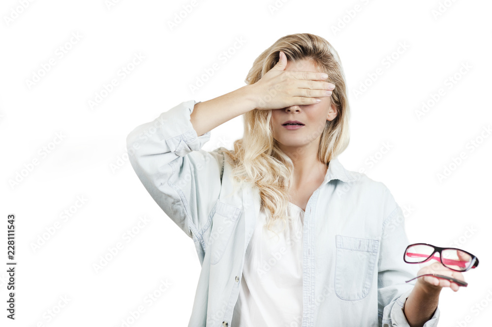 very beautiful young girl broke glasses and holds them in her hands on a white background very beautiful young girl broke glasses and holds them in her hands on a white background